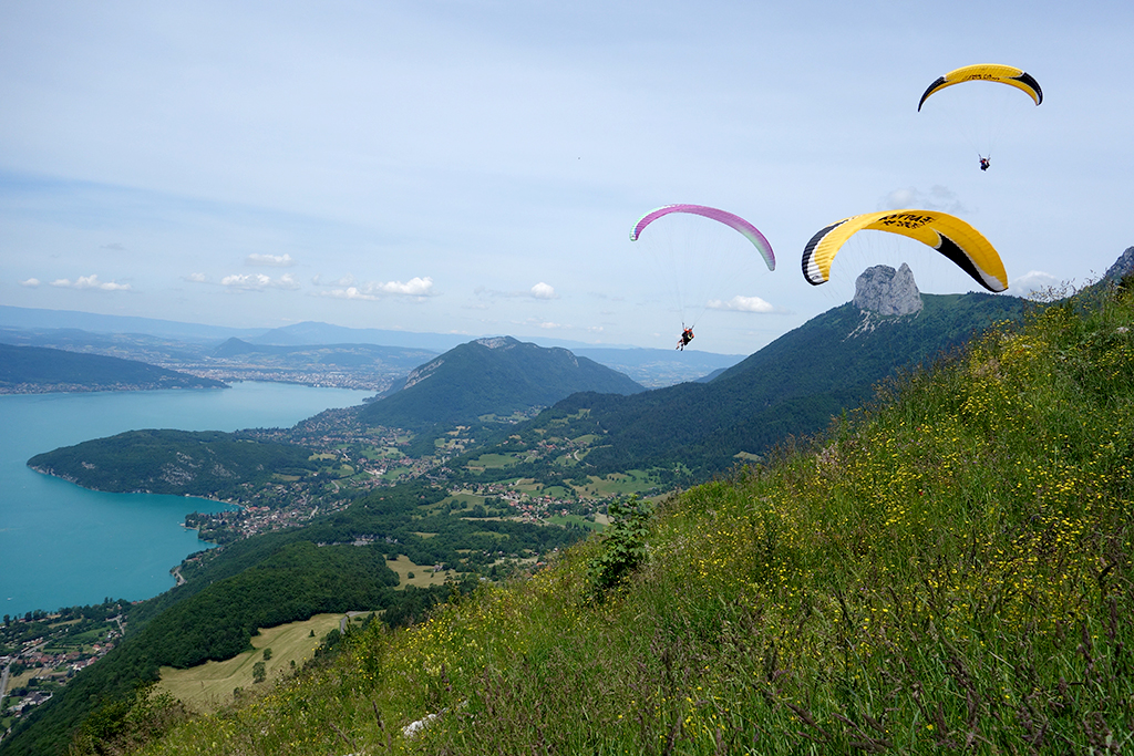 Paragliders over Lake Annecy