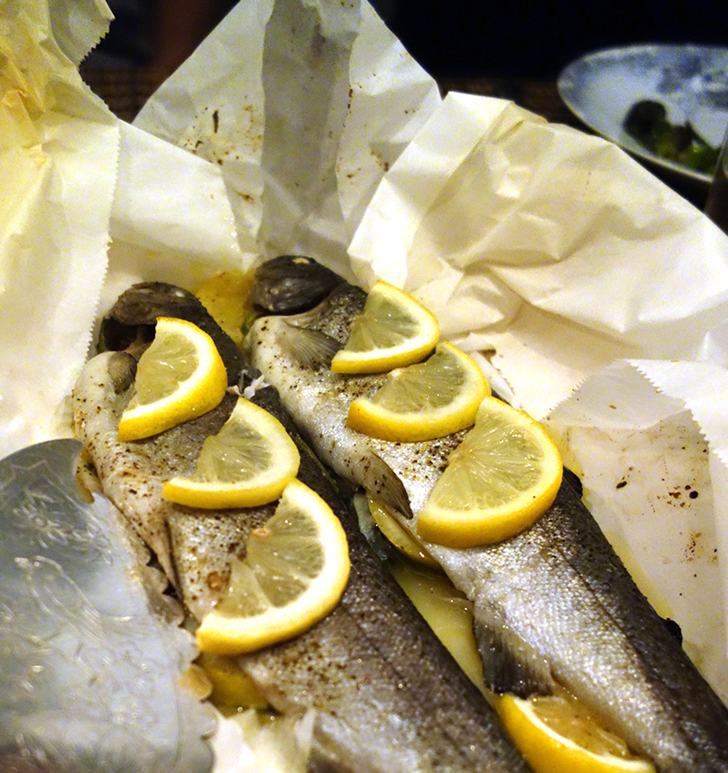 trout in paper with lemon